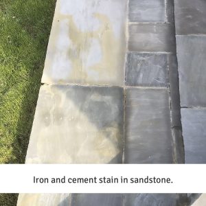 Iron and cement stain in sandstone.