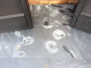 How to remove white calcium markings from slate